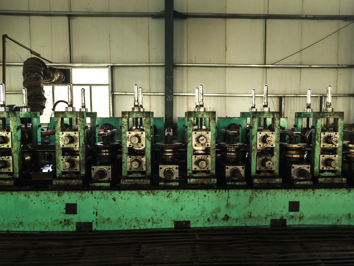 Metal forming machinery on a factory production line