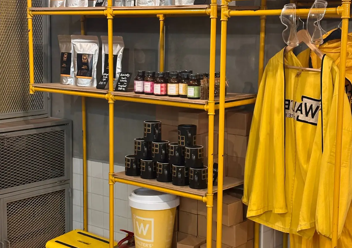 Merchandise displayed on tubular steel shop shelving