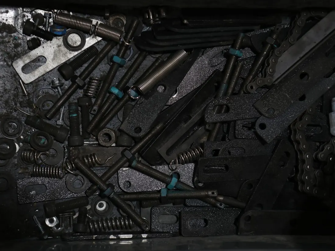 Formed steel components and springs laid out