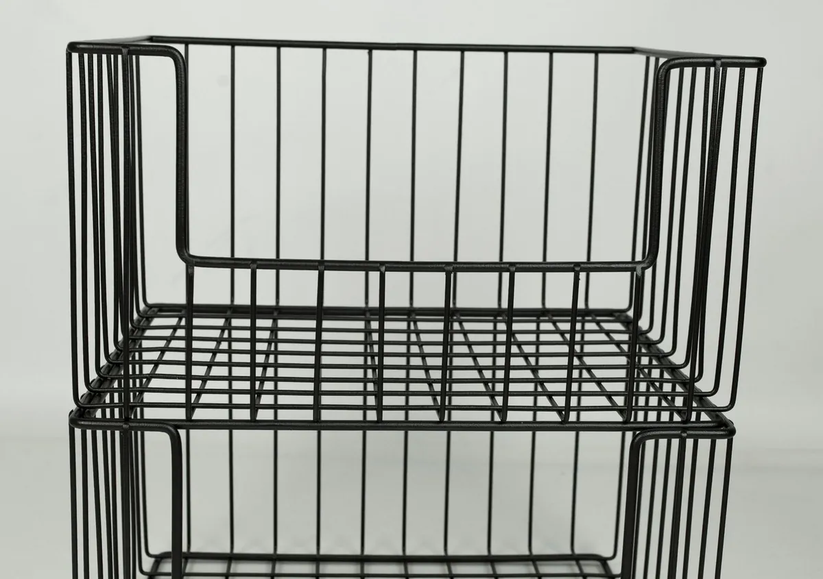A black steel wire storage basket